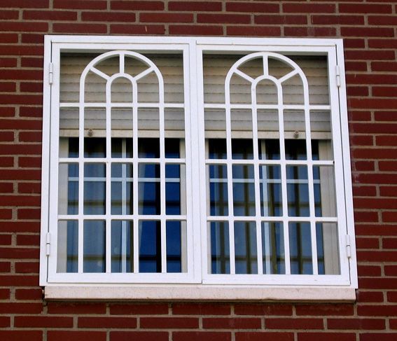 Arched White Steel Window Security Grill with Modern Classic Design